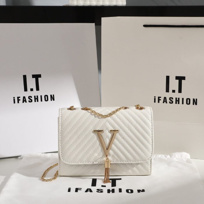 Women's bag shoulder bag new fashion striped embroidered shoulder bag tassel decorative bag messenger bag a generation of hair - Image 4