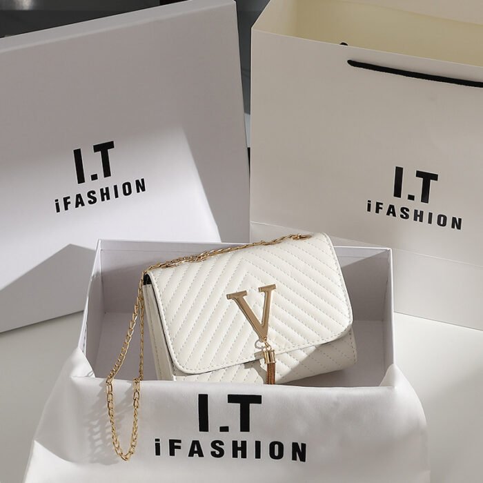 Women's bag shoulder bag new fashion striped embroidered shoulder bag tassel decorative bag messenger bag a generation of hair - Image 1