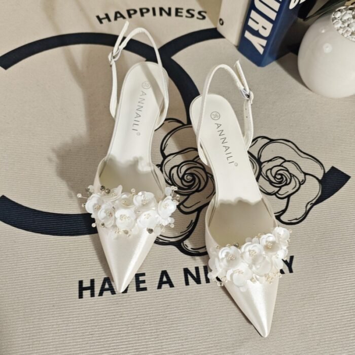 O1CN01RMEx9j1nzKo46gZgK_4256635160-0-cib.jpg 2026 Spring/Summer New Shallow High Heels French White Satin Wedding Shoes Sweet Floral Fairy Style Open Back Pumps - Image 1